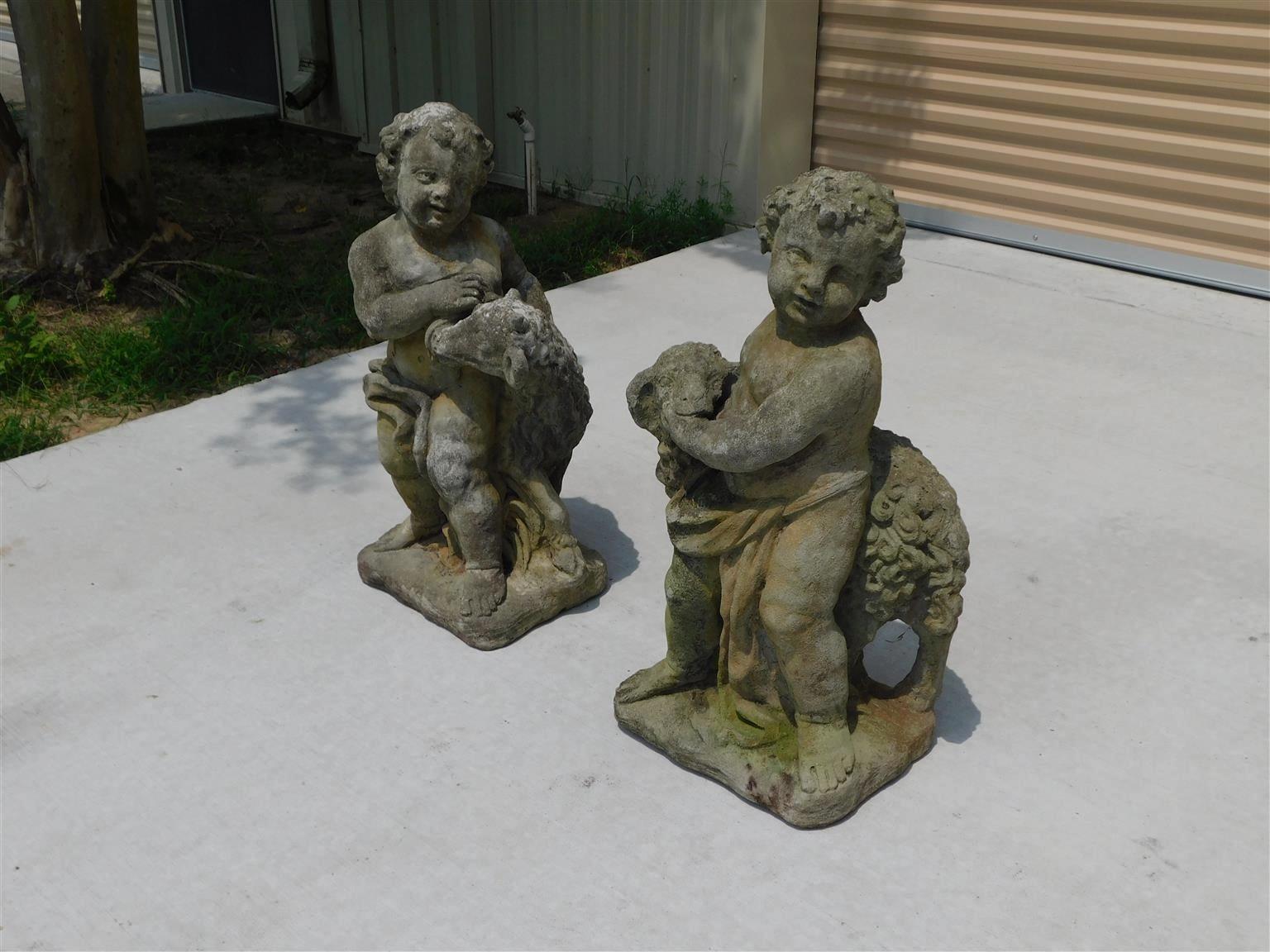 American Empire Pair of American Cast Stone Figural Boy & Girl Holding Lambs on Plinths, C. 1880 For Sale
