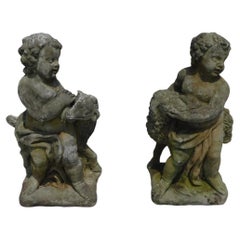 Pair of American Cast Stone Figural Boy & Girl Holding Lambs on Plinths, C. 1880