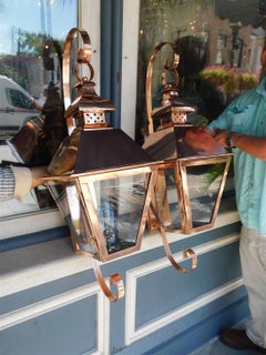 Pair of American Copper Gas Wall Lanterns with Flanking Scrolled Brackets 20th C