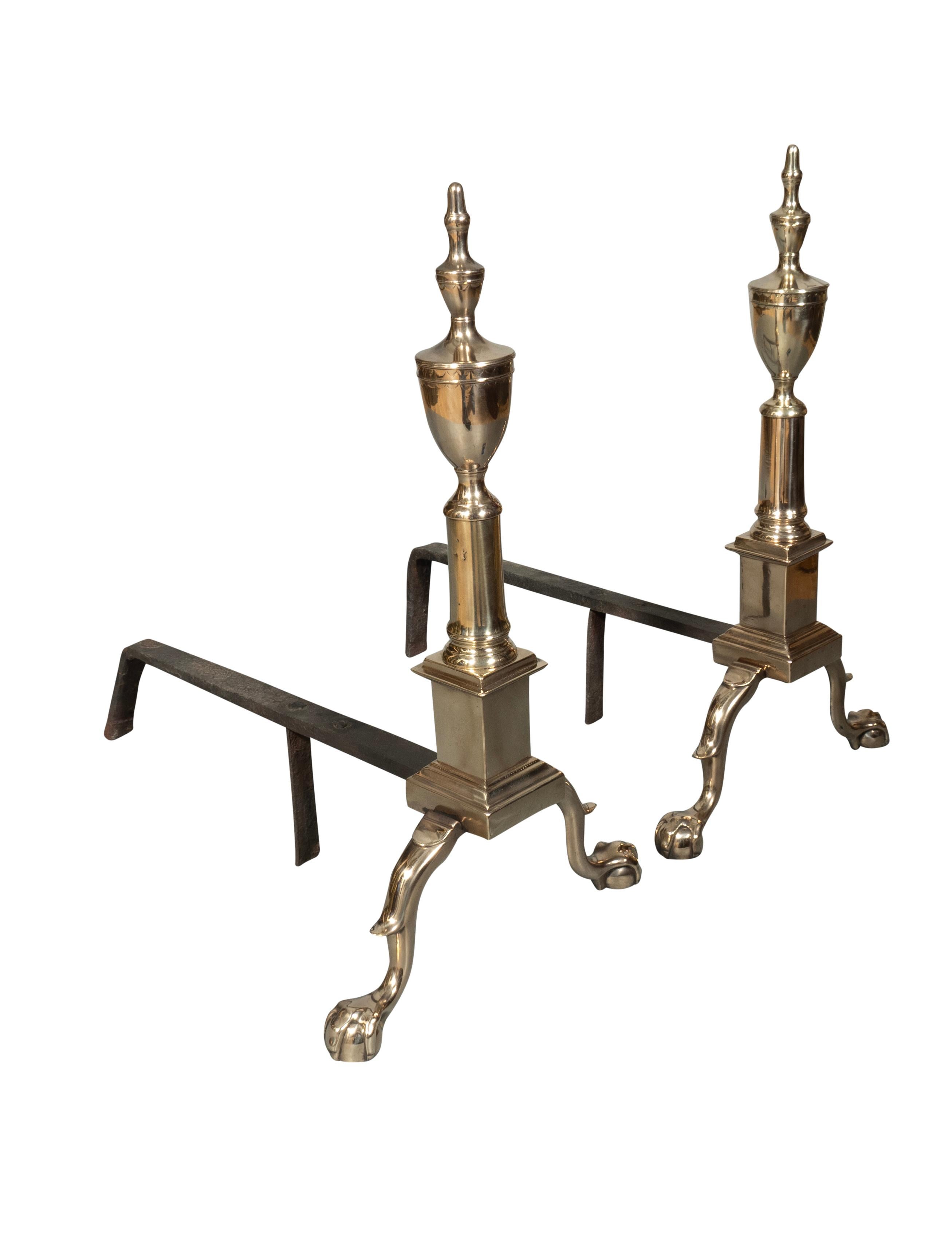 With urn form tops and pair of ball and claw feet. Engraved swags through out. Wrought iron dogs.