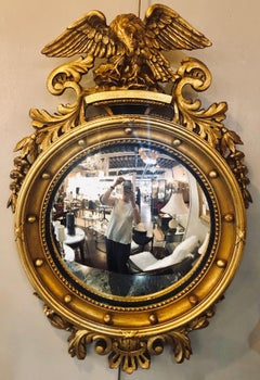 American Federal Style Round Convex Giltwood Mirrors with Opposing Eagles, Pair