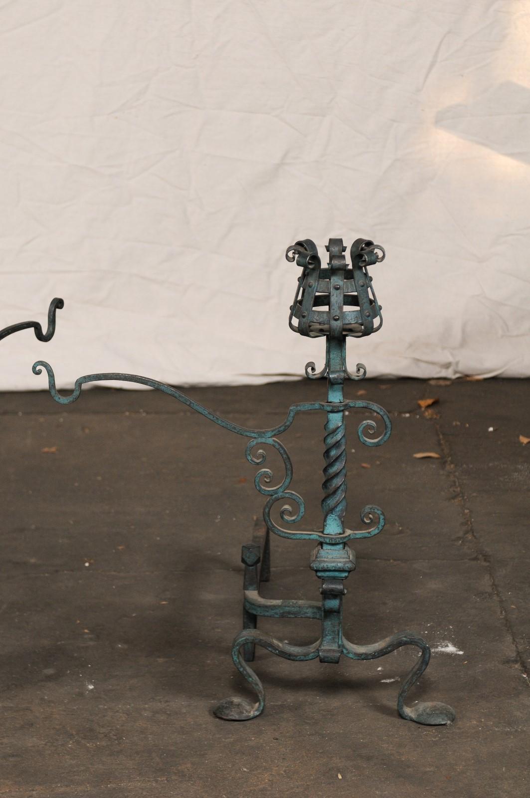 Early 20th Century Pair of American Iron Andirons with Patina Finish and Cooking Arms, circa 1900 For Sale