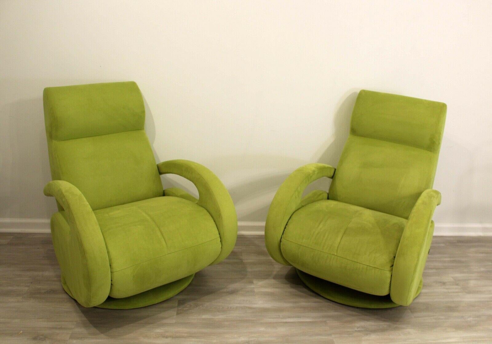 From Le Shoppe Too in Michigan comes this pair of incredibly comfortable pair of chartreuse chairs which both recline fully and swivel, offering the most ergonomic comfort for lounging. Both chairs are in very good condition with little signs of