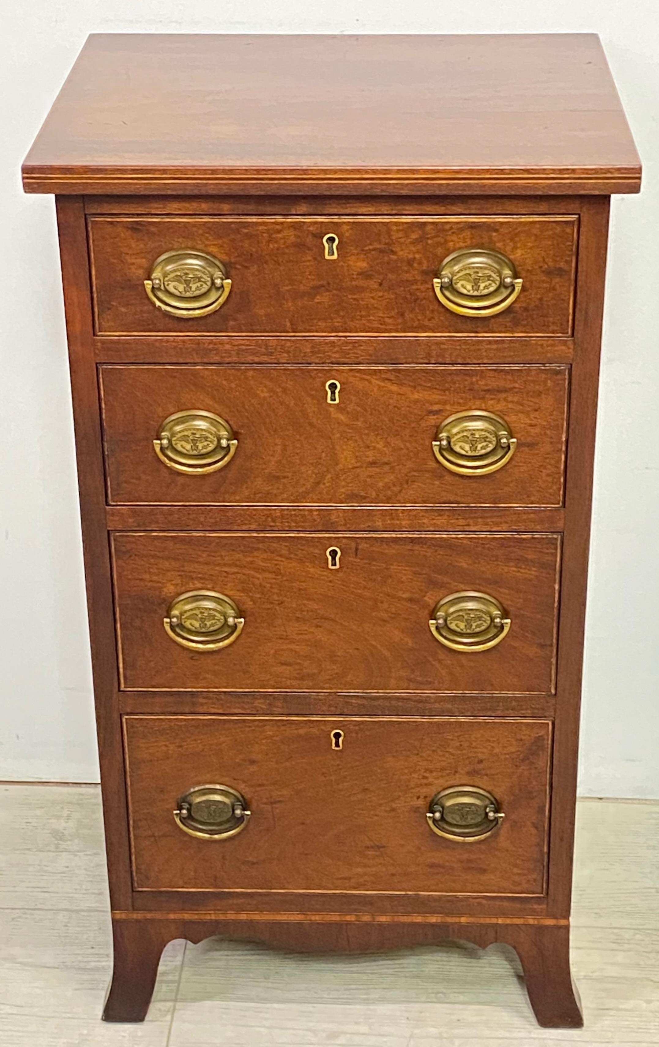 A unusual pair of Federal style mahogany small bedside cabinets or chest of drawers.
In remarkable original condition with original finish and hardware. 
Quality bench made craftsmanship, in excellent condition.
American, mid to late 19th century.