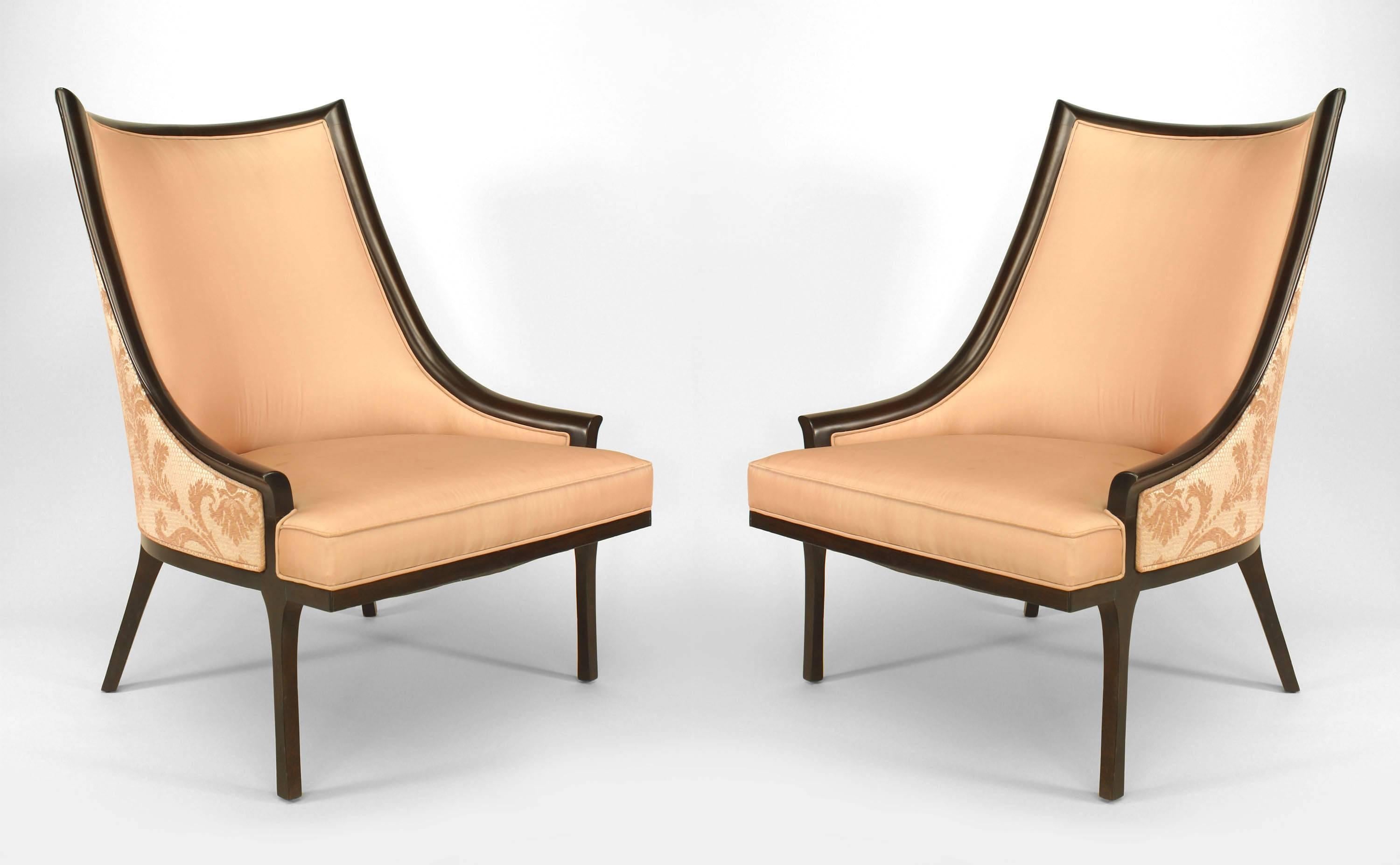 Pair of American 1950s ebonized Armchairs with gondola form sleigh back design

