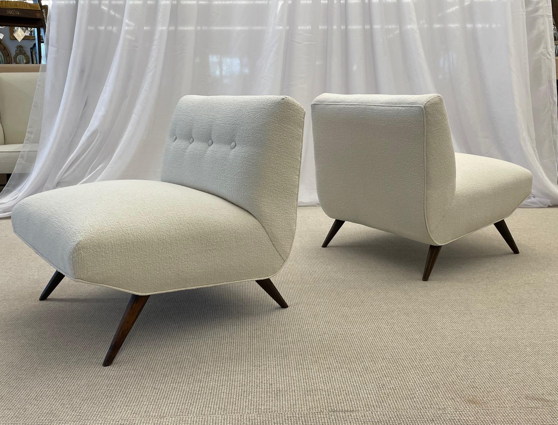 Pair of American Mid-Century Modern style slipper chairs, Paul McCobb, Kravet Bouclé having a sprayed walnut leg.