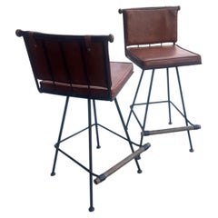 Pair of American Mid Century Rustic Wrought Iron Oak Swivel Bar Stools