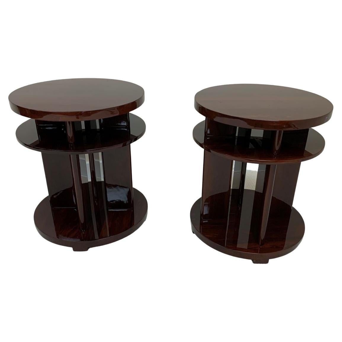 Elegant Art Deco side table reminiscent of the works by Donald Deskey or Gilbert Rohde. The table features three circular tiers connected by four streamline supports. A very versatile piece; perfect as an end, side or bedside table. Dimensions: 24