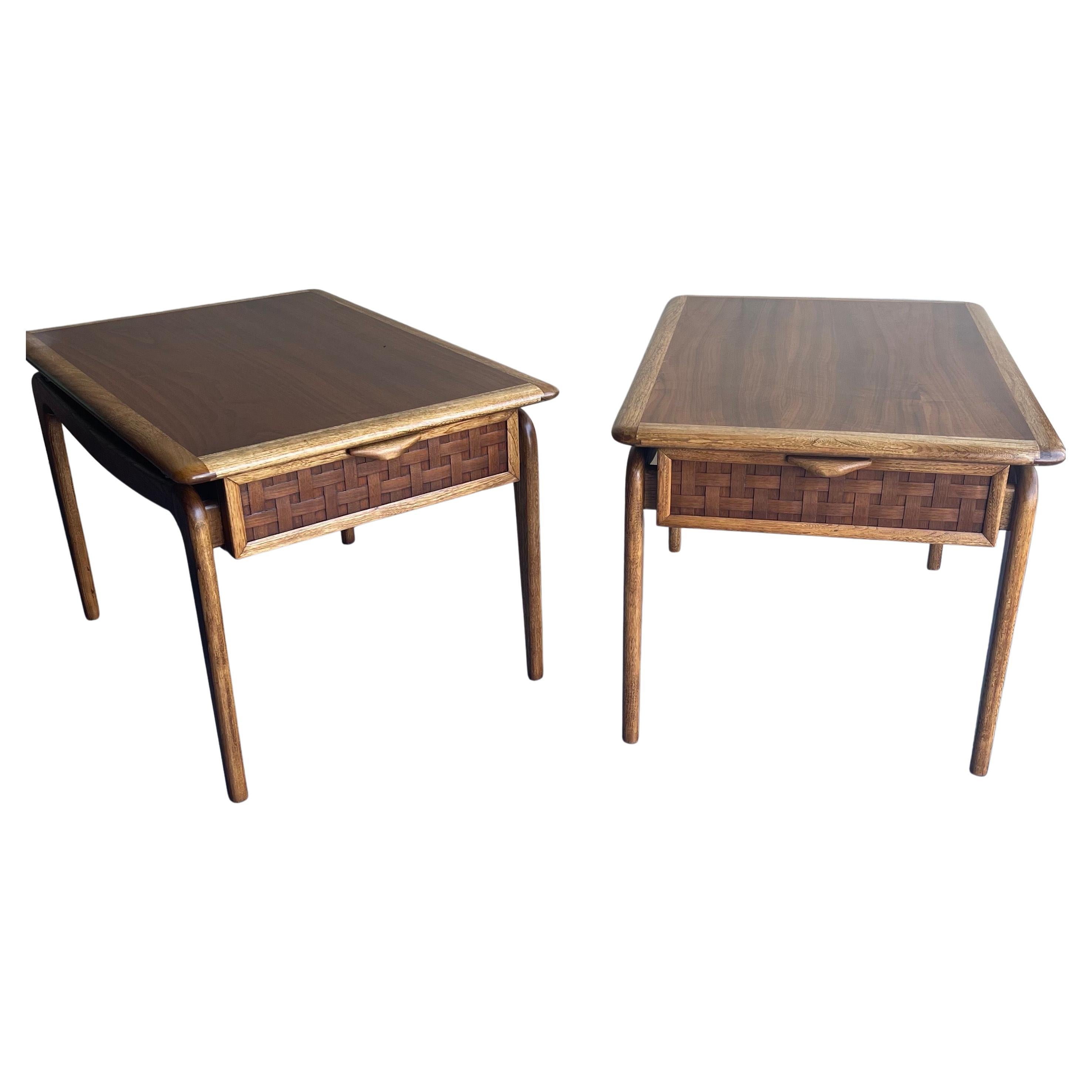 A very nice pair of American modern walnut with oak accent end tables from the 