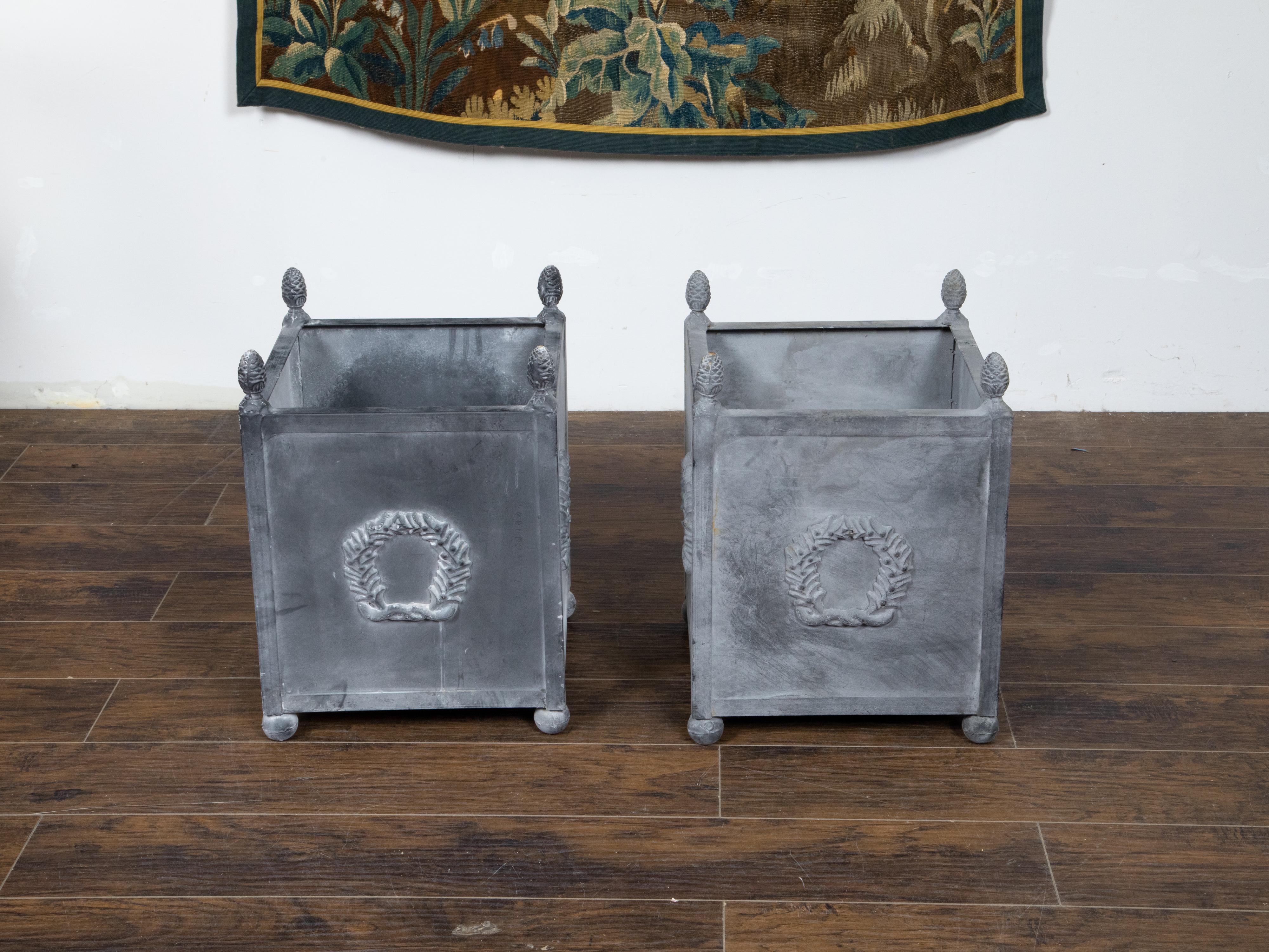 Painted Pair of American Neoclassical Style Grey Metal Planters with Laurel Wreaths For Sale