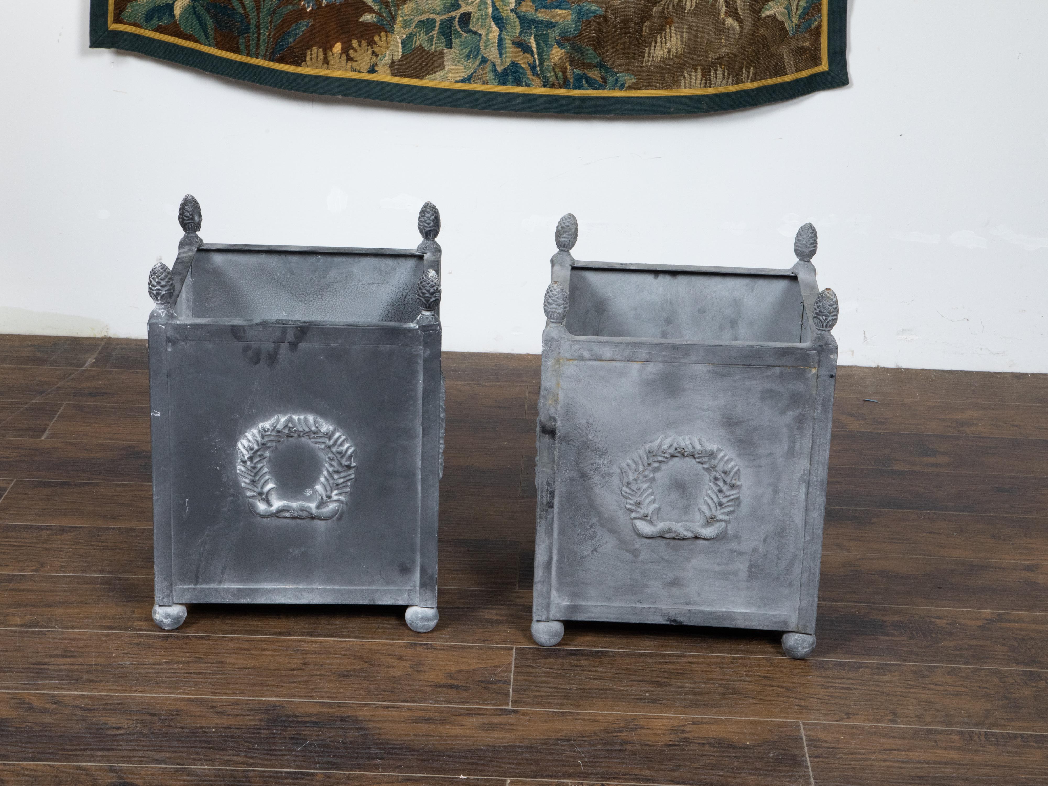 Pair of American Neoclassical Style Grey Metal Planters with Laurel Wreaths In Good Condition For Sale In Atlanta, GA