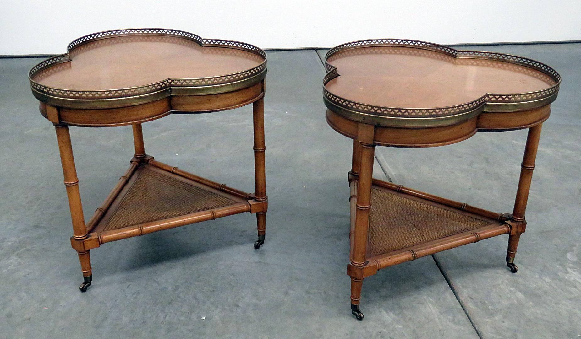 Pair of 2-tier faux bamboo side tables with brass galleries.