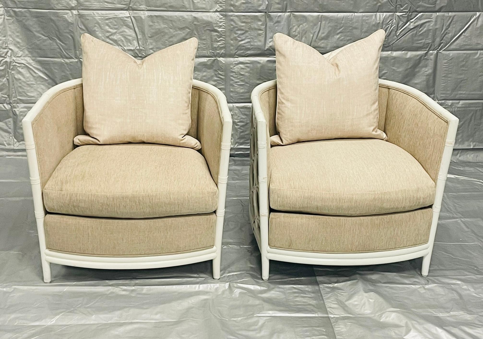 Pair of vintage armchairs designed and manufactured in San Francisco, California by McGuire of San Francisco. These iconic chairs feature the brand’s signature rattan craftsmanship with circular lattice frames, finished in a soft ivory tone and