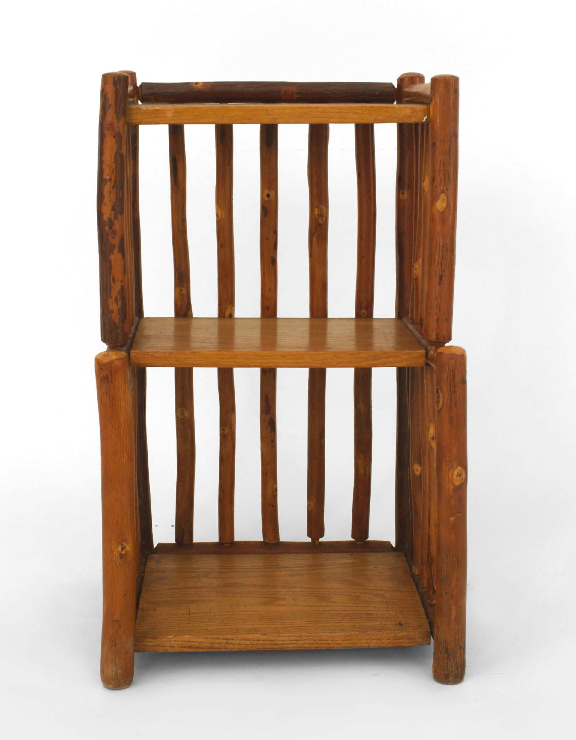 Pair of American Rustic Old Hickory two-tier bedside end tables with hickory wood spindles supporting three oak shelves.
   

Since 1899 Old Hickory Furniture has been handcrafted in Central Indiana using the remarkable hickory sapling and other