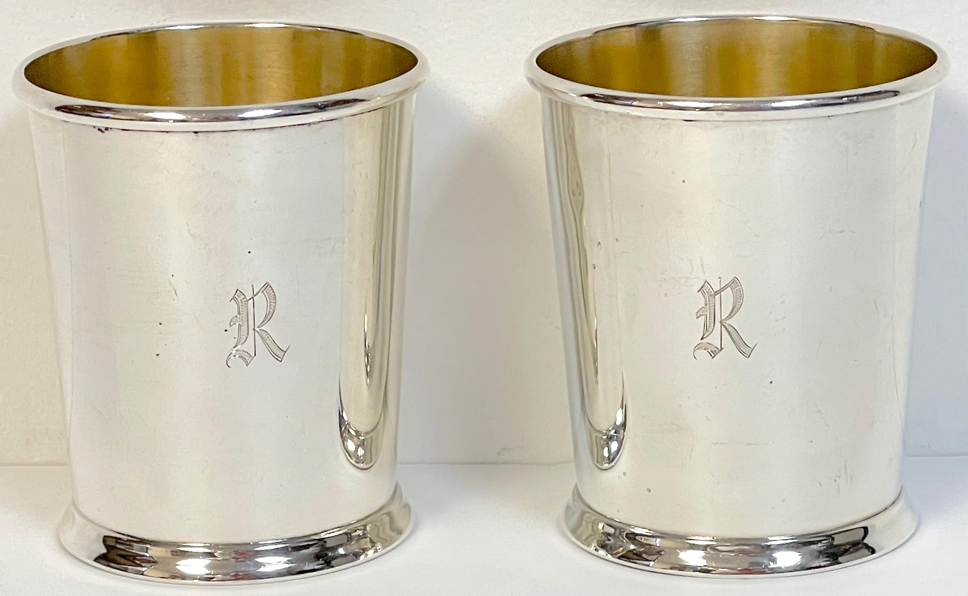 Pair of American Sterling Mint Julep Cups with Gold Washed Interiors
Fisher Silver Company, USA, Circa 1978

Each one of typical form, well crafted with applied rim and gold washed interior, the tapering base raised on an applied rim, 'Stamped