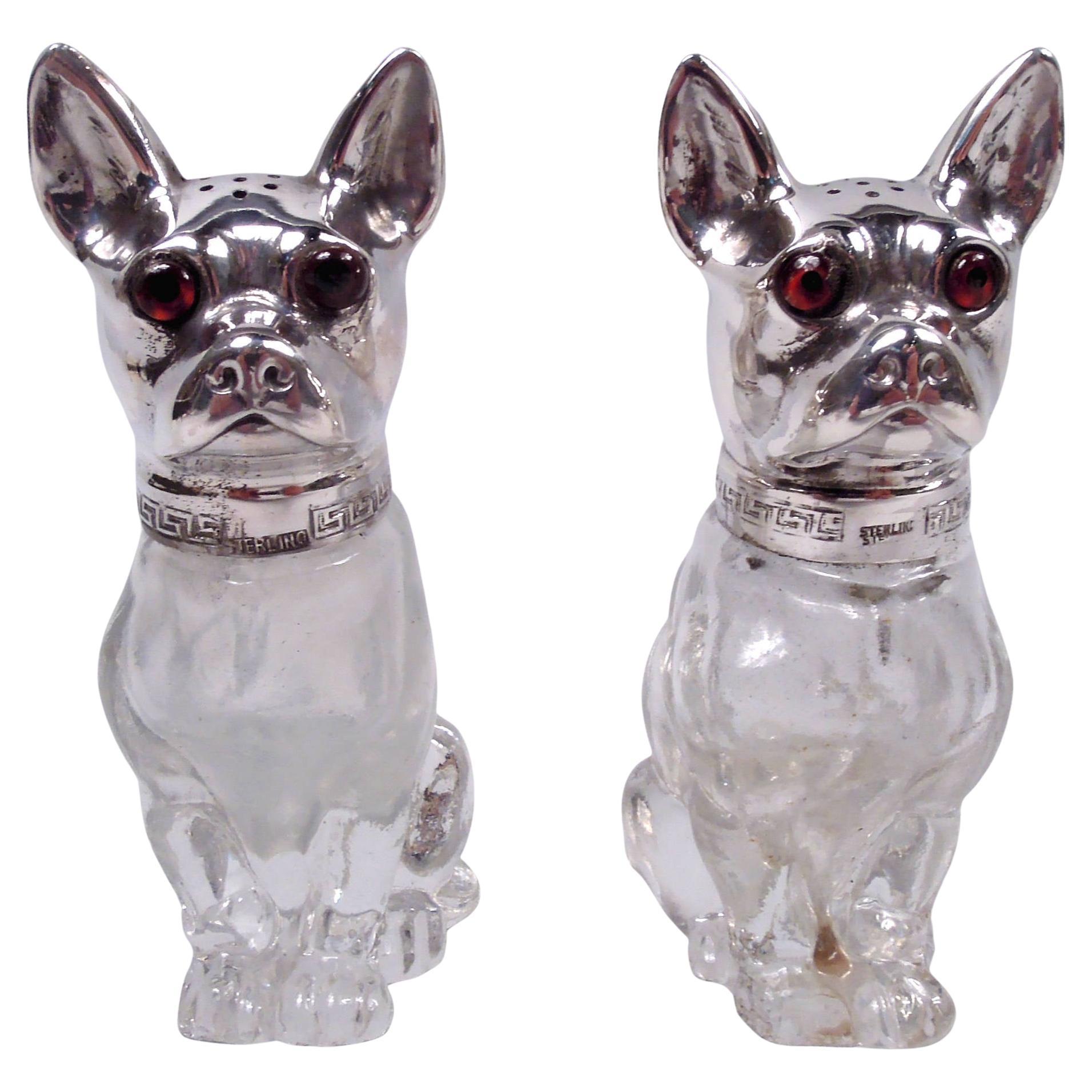 Paire de salières et de poivrières en argent américain avec chien