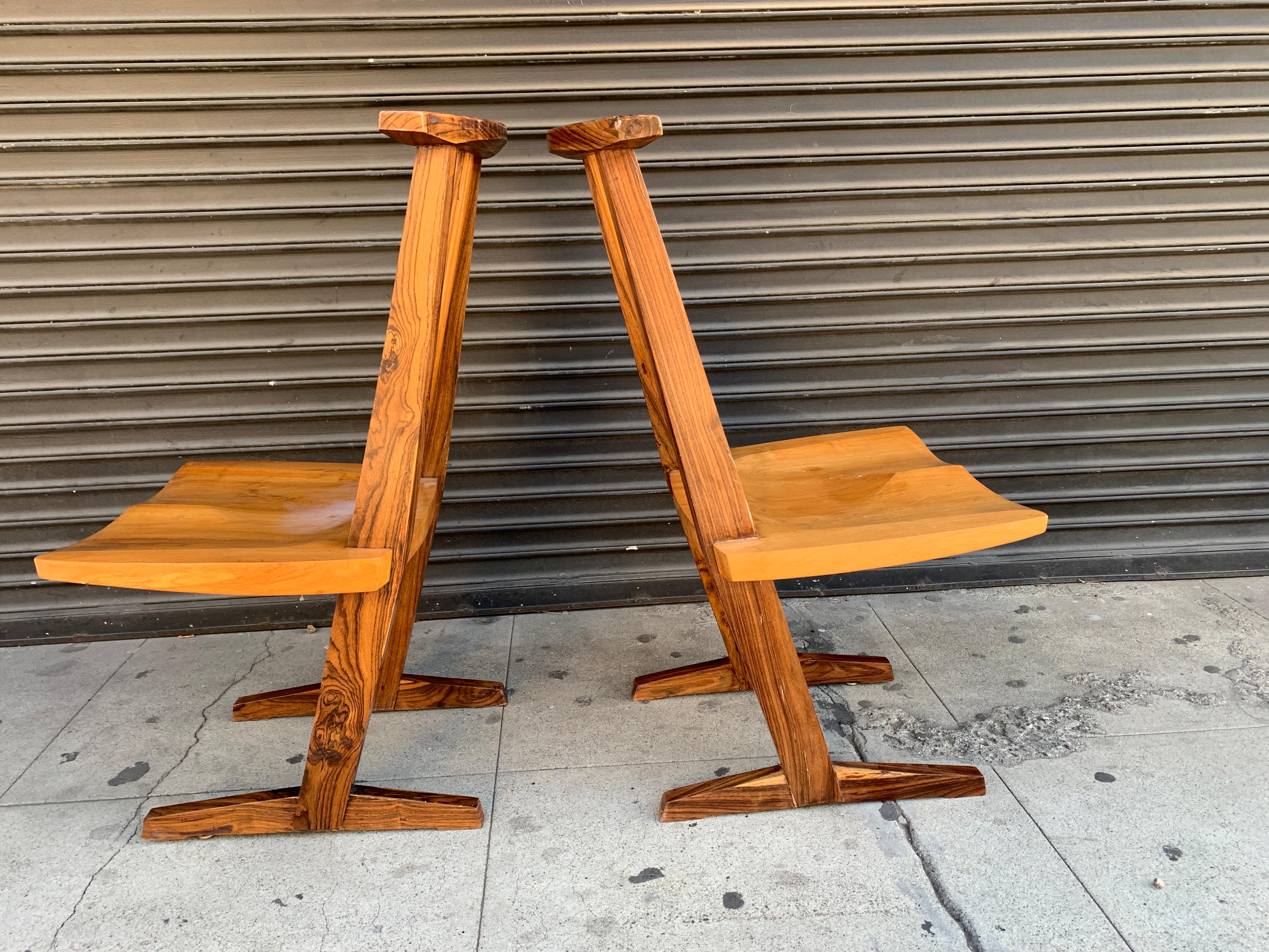 American studio conoid chairs styled after George Nakashima. The chairs features a comb shaped back and molded seat with beautiful architectural lines.
Please note of wear consistent with age.

Measurements:
Height 41.00 in. 
Width 20.00 in.