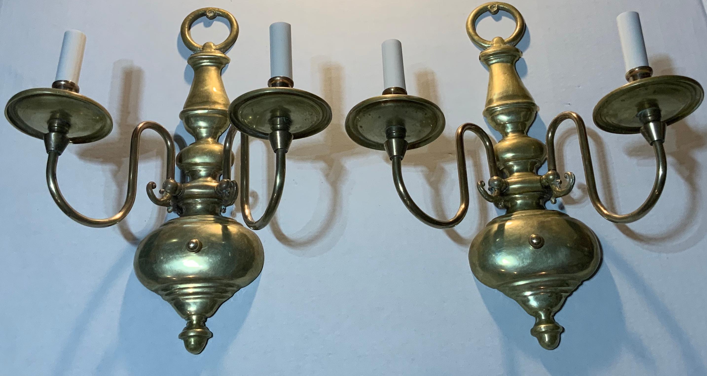 Beautiful pair of wall sconces made of solid brass newly rewire with two 60/watt light each. Ready to use.