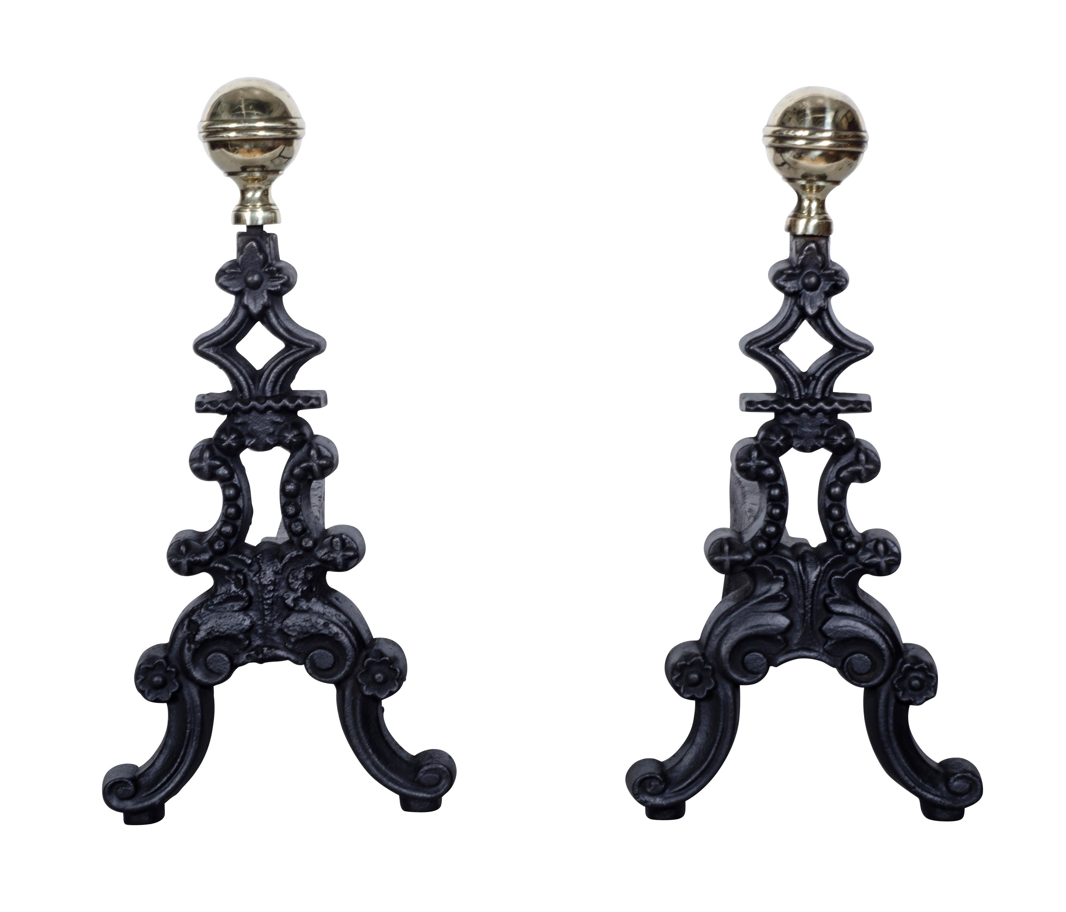 These were made for city small fireplaces. Brass finials cast iron legs. Polished and painted.