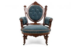 Pair of American Victorian Carved Rosewood & Tufted Powder Blue Velvet Armchairs