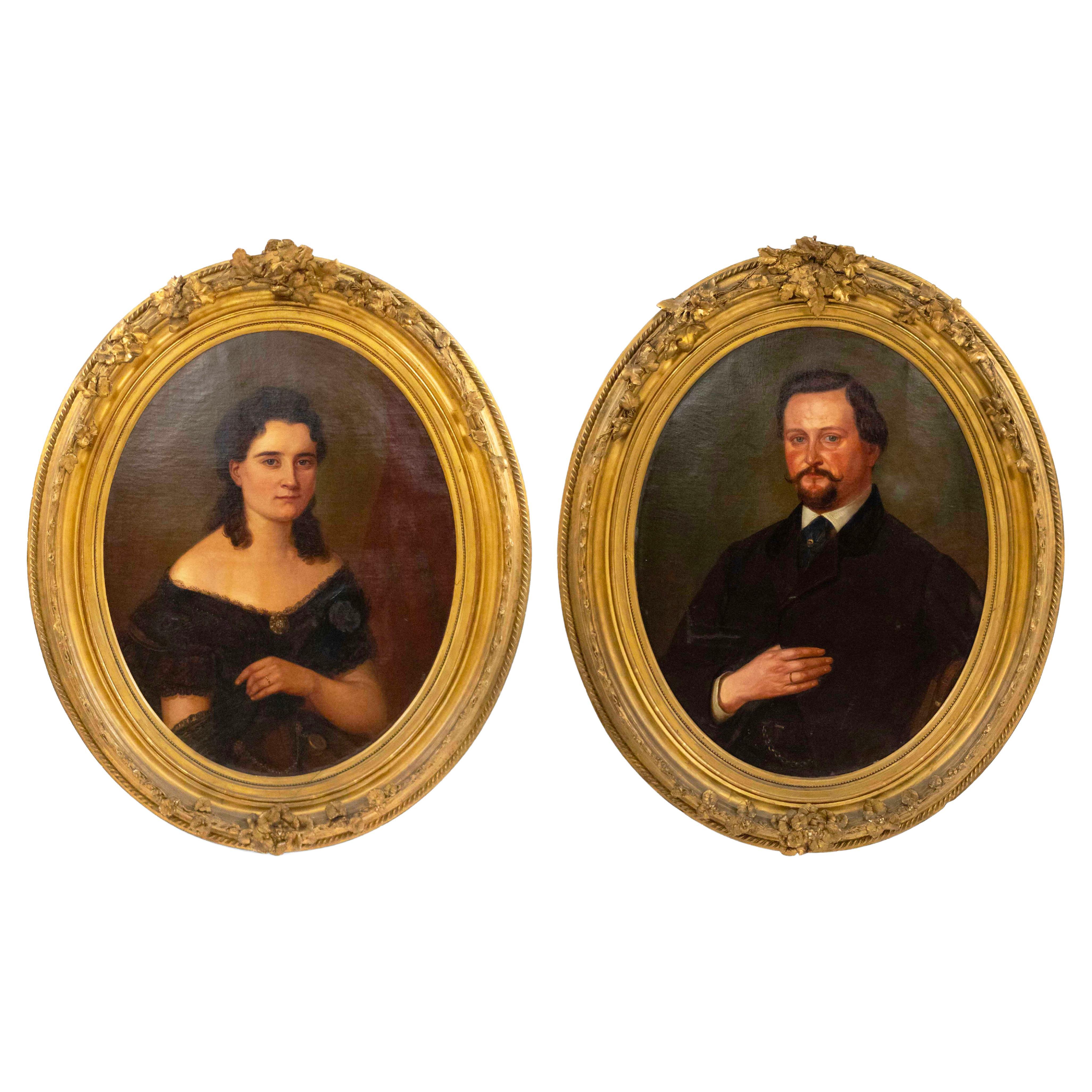 Paire de deux portraits à l'huile américains victoriens d'époque victorienne dans des cadres ovales dorés