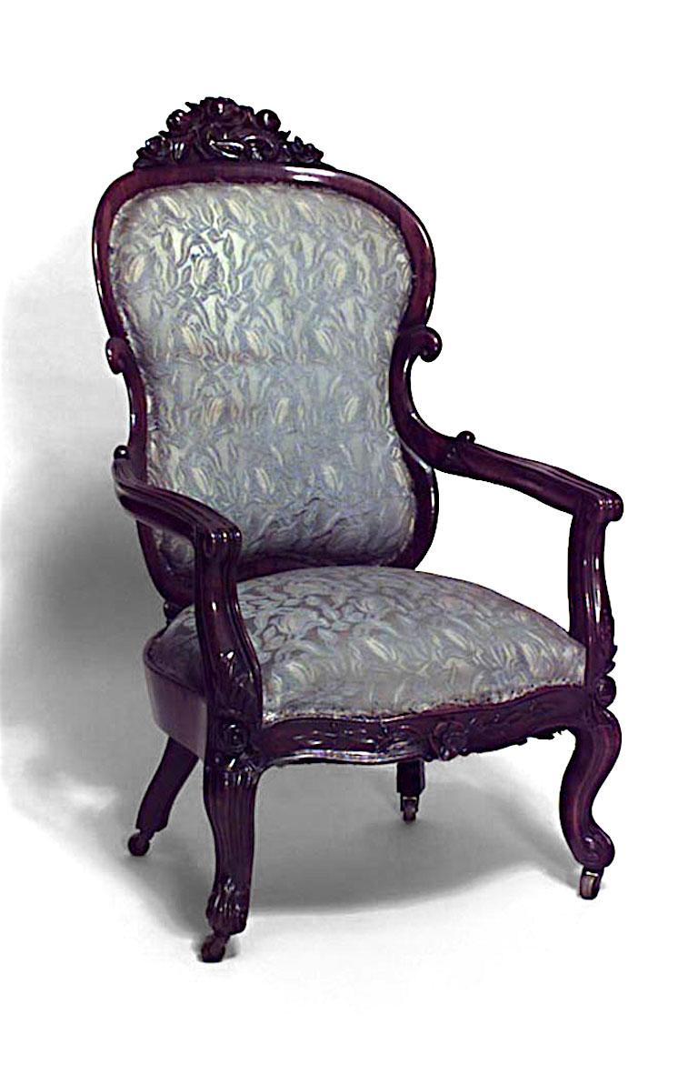 Pair of American Victorian rosewood Armchairs with upholstered seat and back and carved crest on back. (Attributed to JOHN HENRY BELTER) (PRICED AS Pair)
