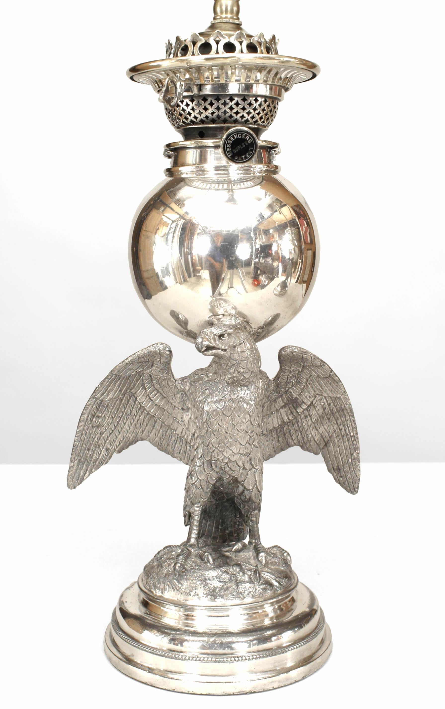 Pair of American Victorian-style (19th Century) silver plate eagle base oil lamps mounted for electricity (PRICED AS Pair).
