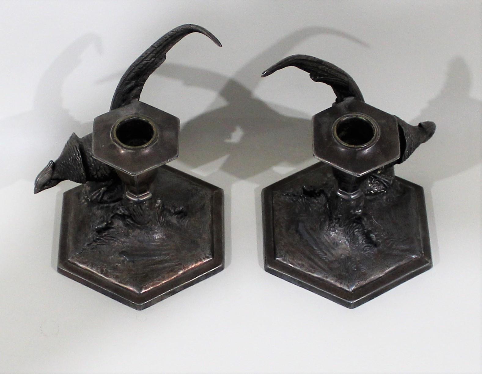 pair of silver plated candlesticks