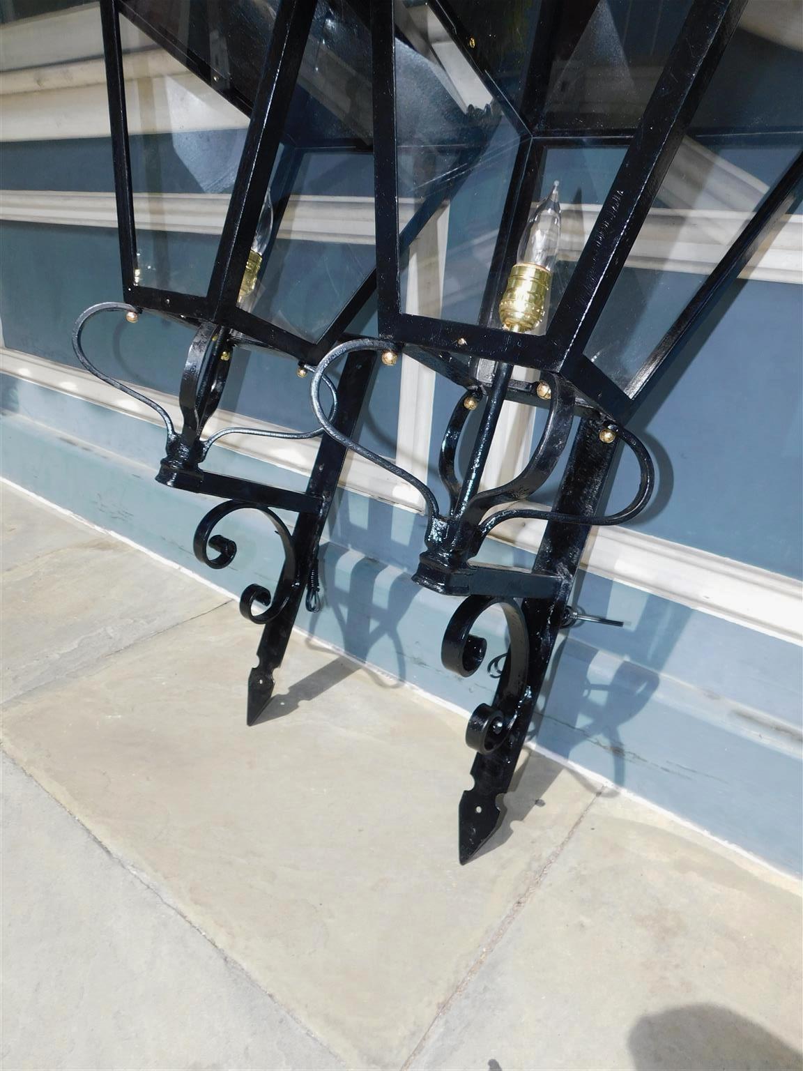 Mid-19th Century Pair of American Wrought Iron and Spelter Finial Mounted Wall Lanterns, C. 1850 For Sale