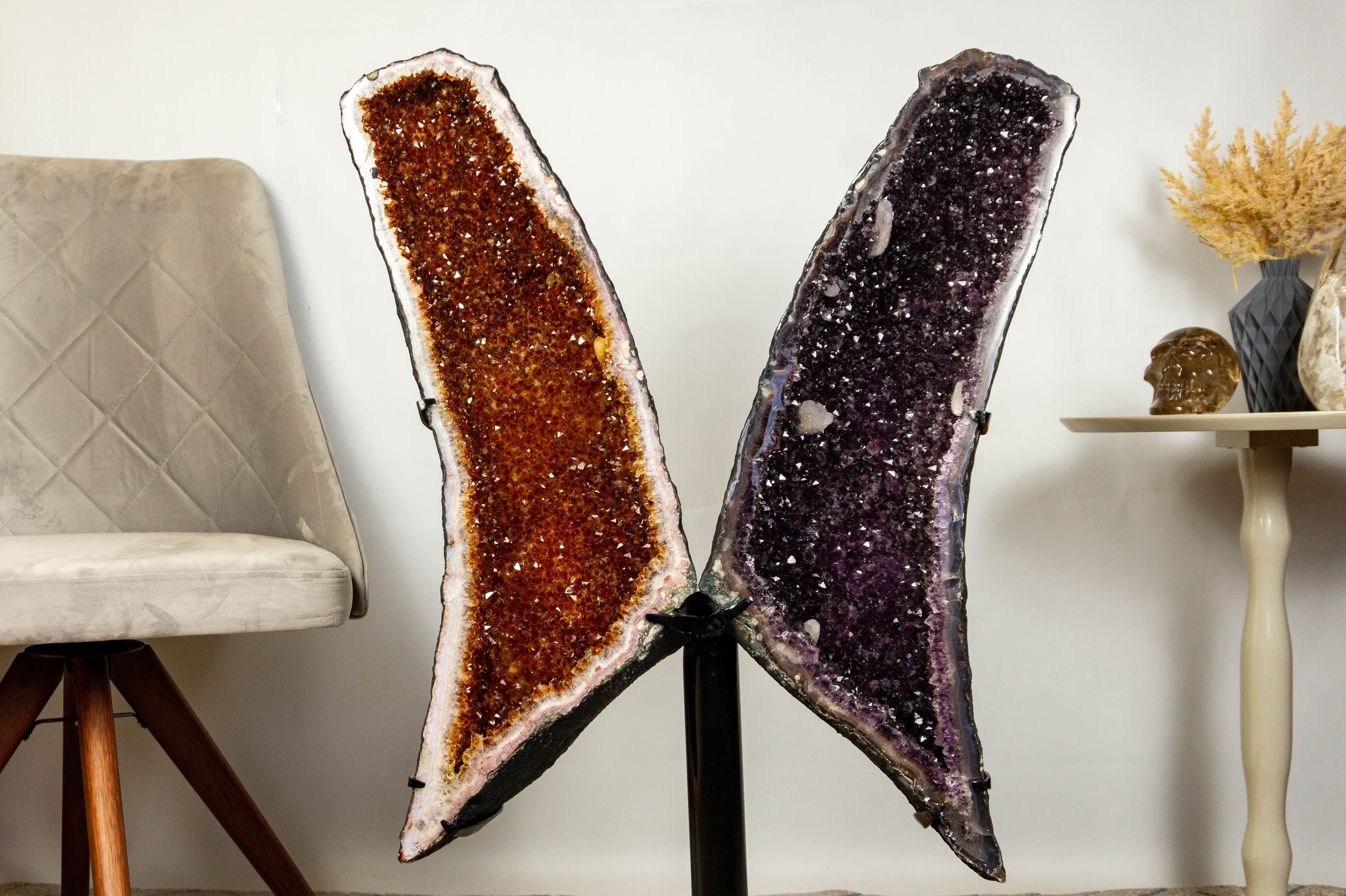 A finely aesthetic book-matched pair of Amethyst and Citrine geodes, these sculptured geode wings are unusual due to both specimens' extremely high (AAA) quality. The Amethyst Geode is totally natural, showing us a rich and deep tone of purple,