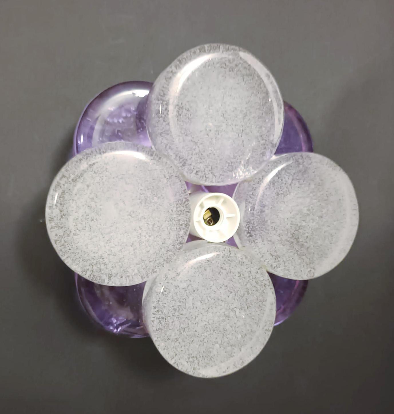 Vintage Italian wall lights or flush mounts with hand blown amethyst and clear bubbles Murano glasses petals mounted on nickel frames / made in Italy by Albano Poli for Poliarte, circa 1970s
Measures: diameter 7 inches, height 3 inches.
1 Light /