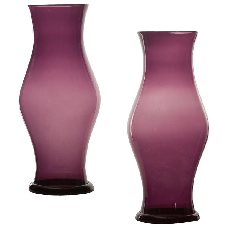 Pair of Amethyst Colored Glass Hurricanes from the Midcentury Period at