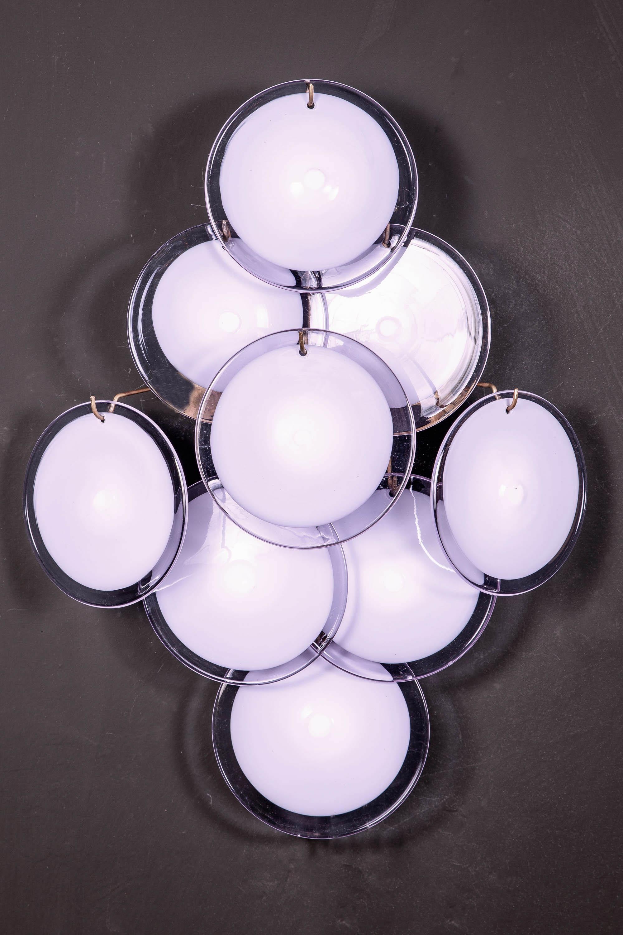 Pair of sconces with nine amethyst color vistosi discs Murano.
 Available also with white and heavenly and amber color.
    
