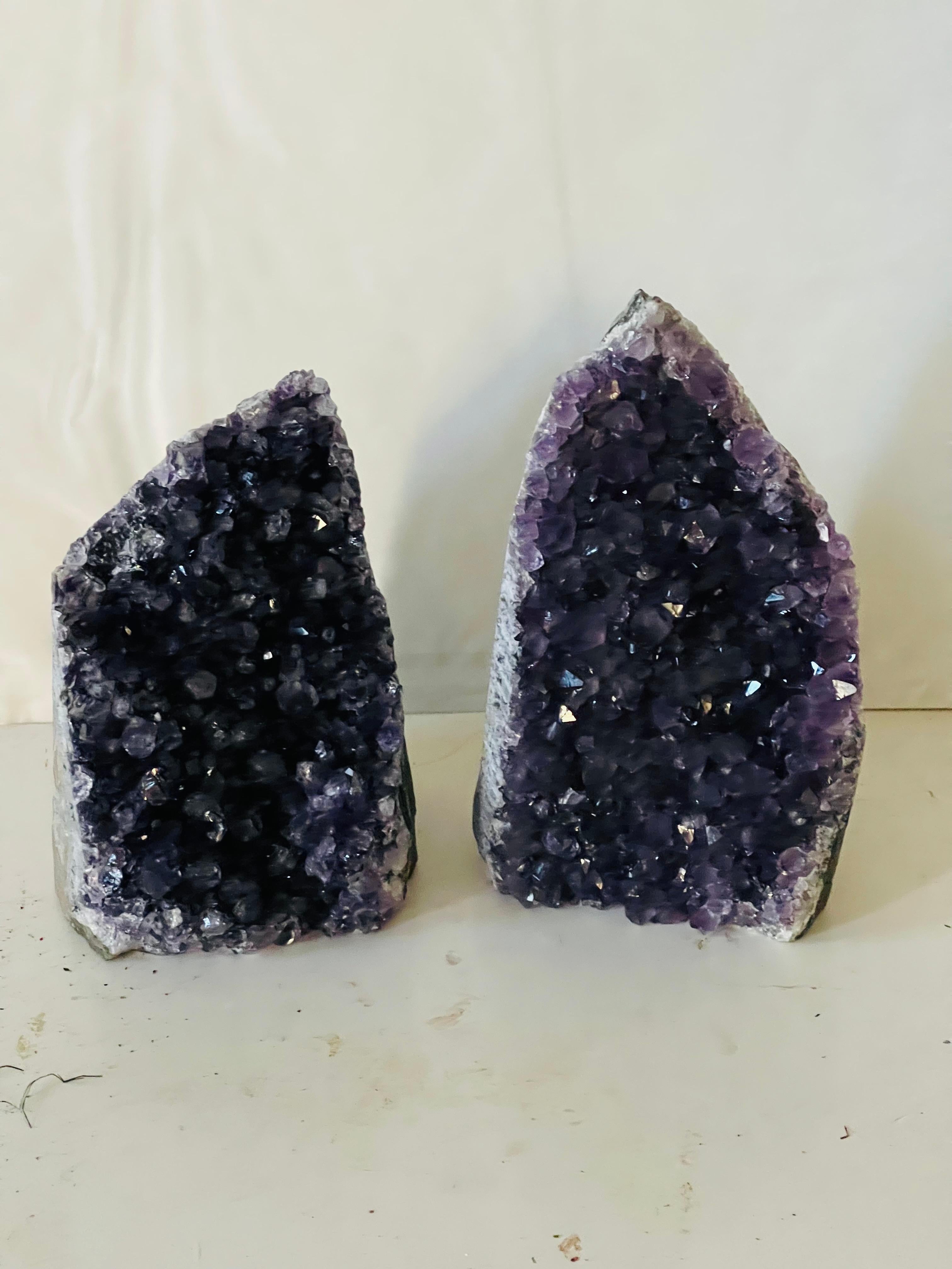 Pair of amethyst geode bookends in deep color. 