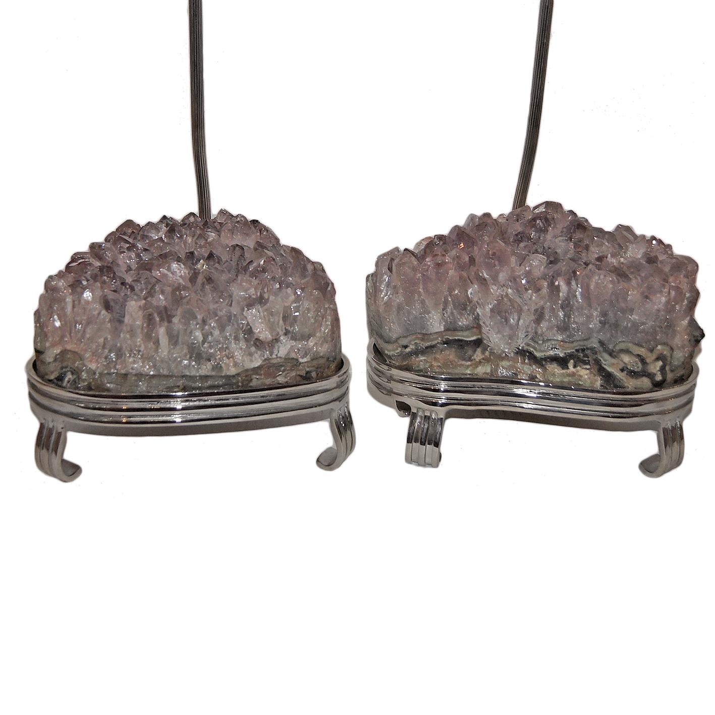 A pair of circa 1960's silver finish Italian table lamps with amethyst stones.

Measurements:
Height to shade rest: 35