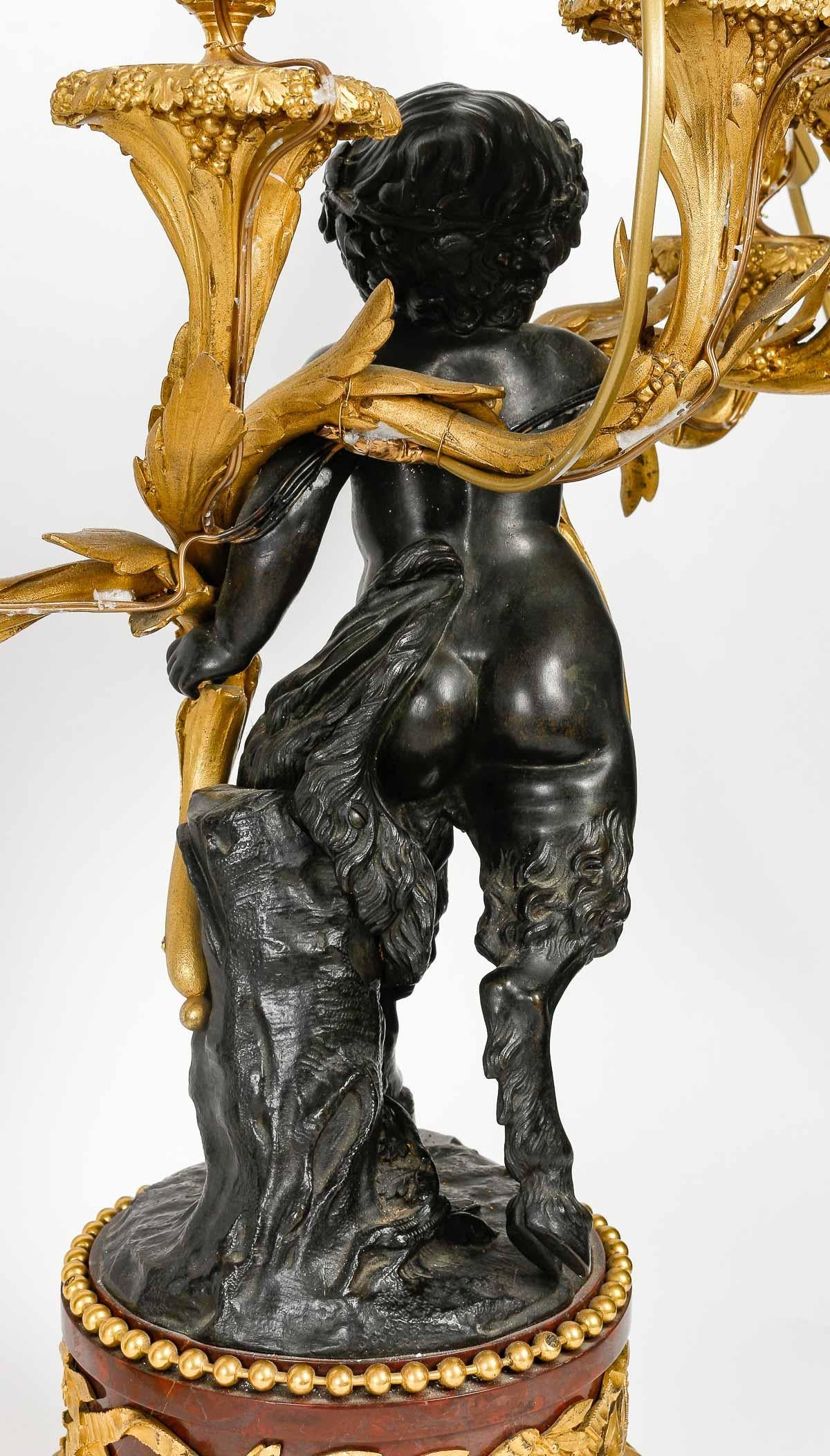 Bronze Pair of Amours Candelabra, Grande décoration, Gilt bronze, Antique bronze.