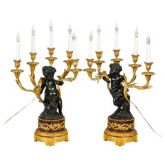 Paire de candélabres Amours, Grande décoration, Bronze doré, Bronze ancien.