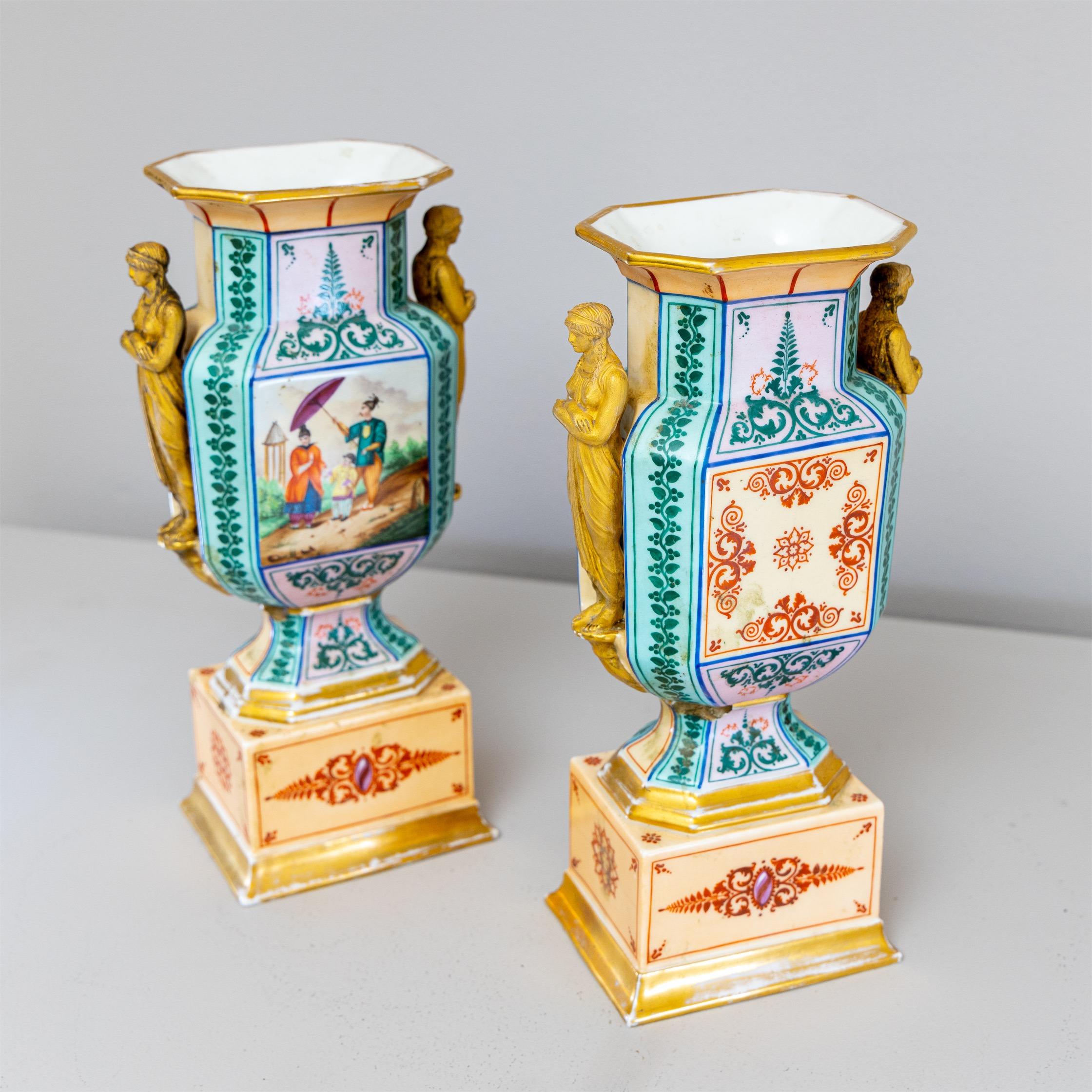 European Pair of Ceramic Amphoras with figurative Scenes, Blue and Gold, around 1830 For Sale