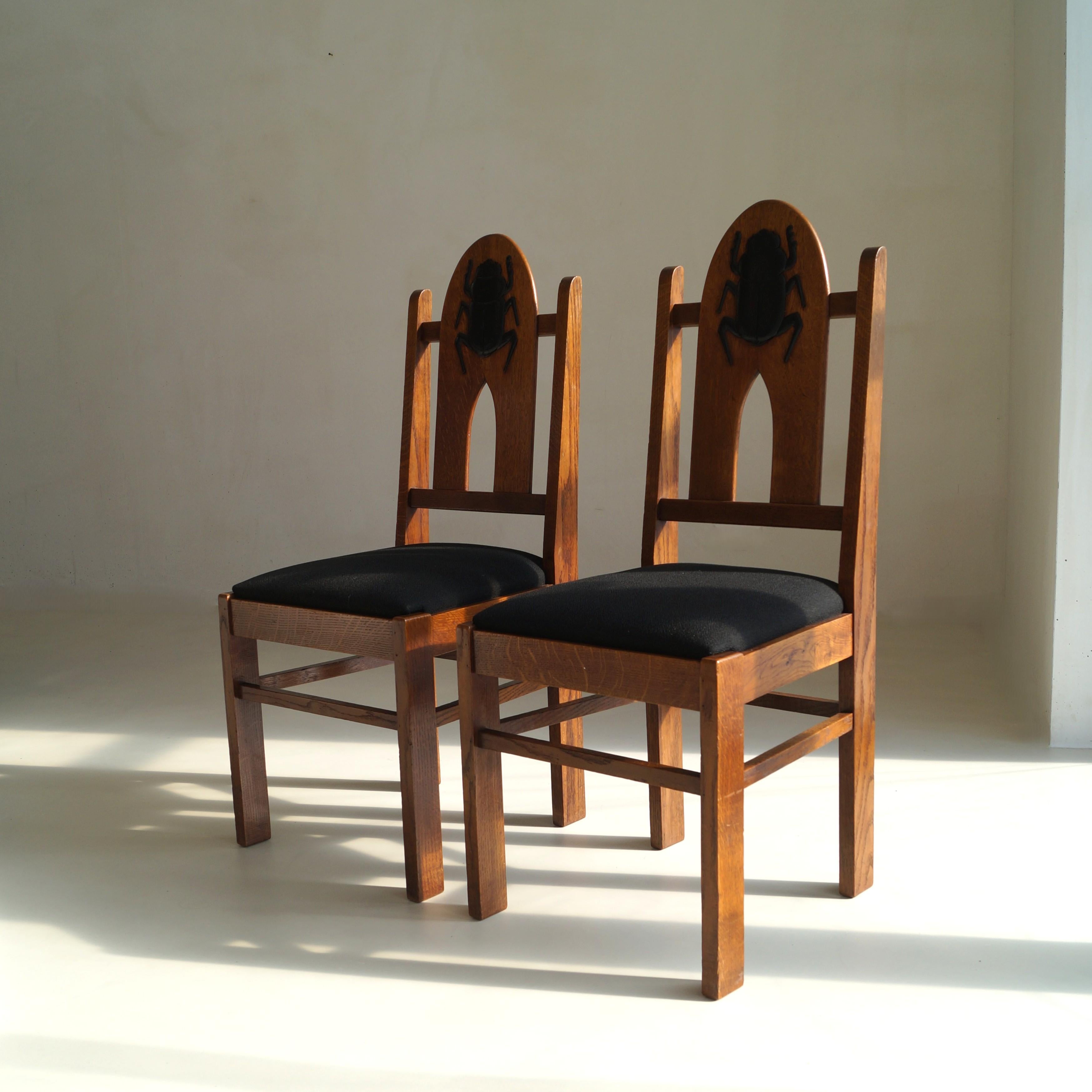 Early 20th Century Pair of Amsterdam School Chairs with 'Egyptomania' Scarabs on backrest, c. 1925 For Sale
