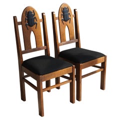 Pair of Amsterdam School Chairs with 'Egyptomania' Scarabs on backrest, c. 1925