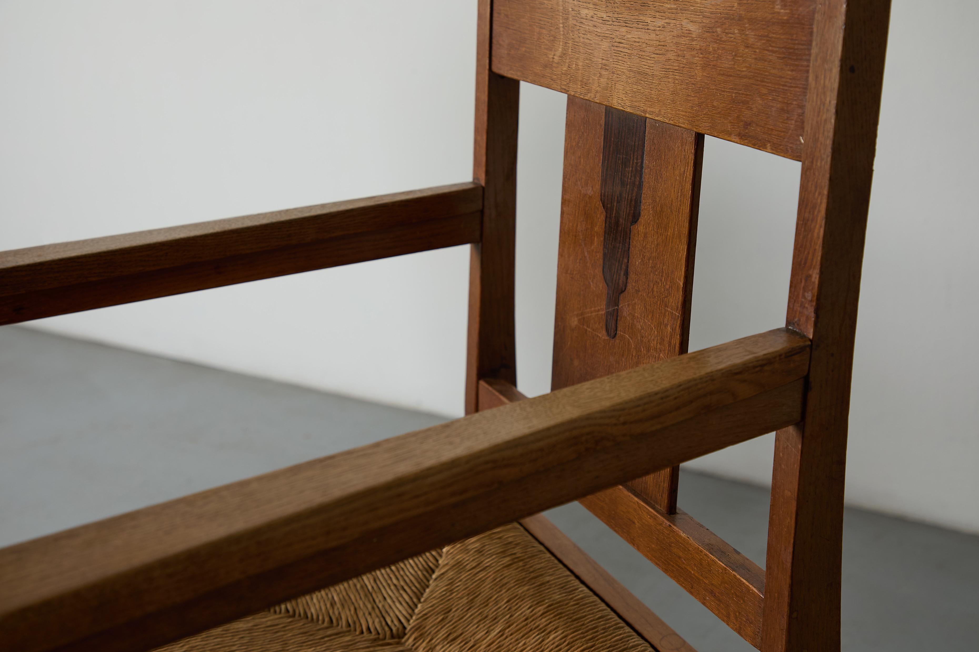 Paire de chaises à accoudoirs en chêne et jonc de l'école d'Amsterdam en vente 2