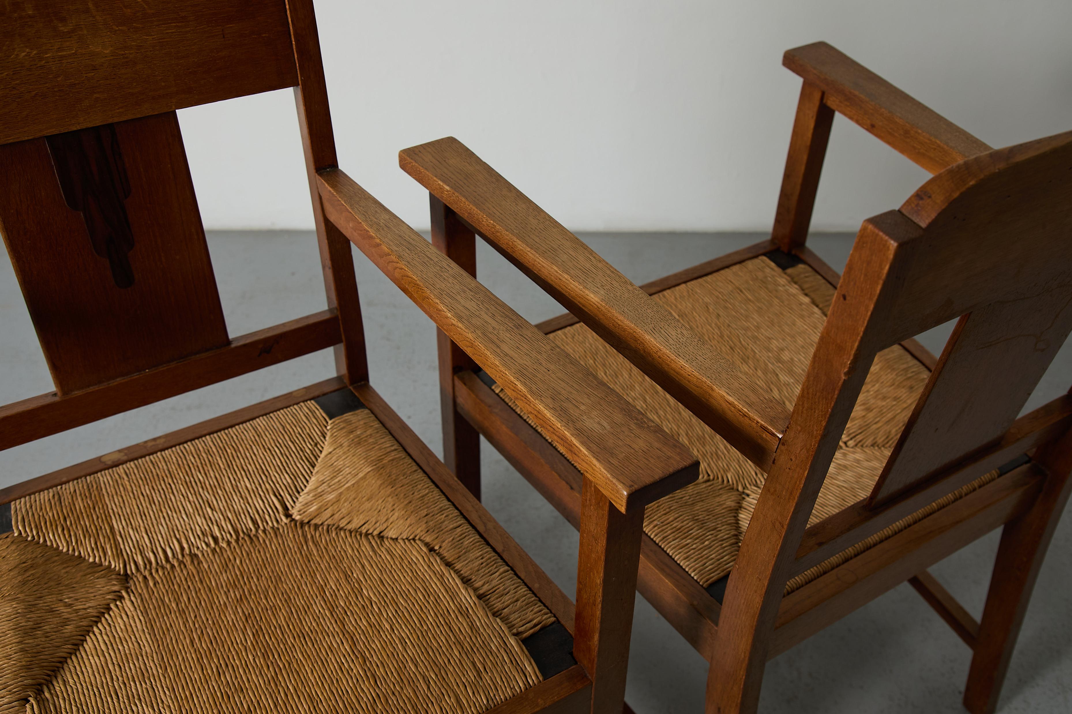 Paire de chaises à accoudoirs en chêne et jonc de l'école d'Amsterdam en vente 8
