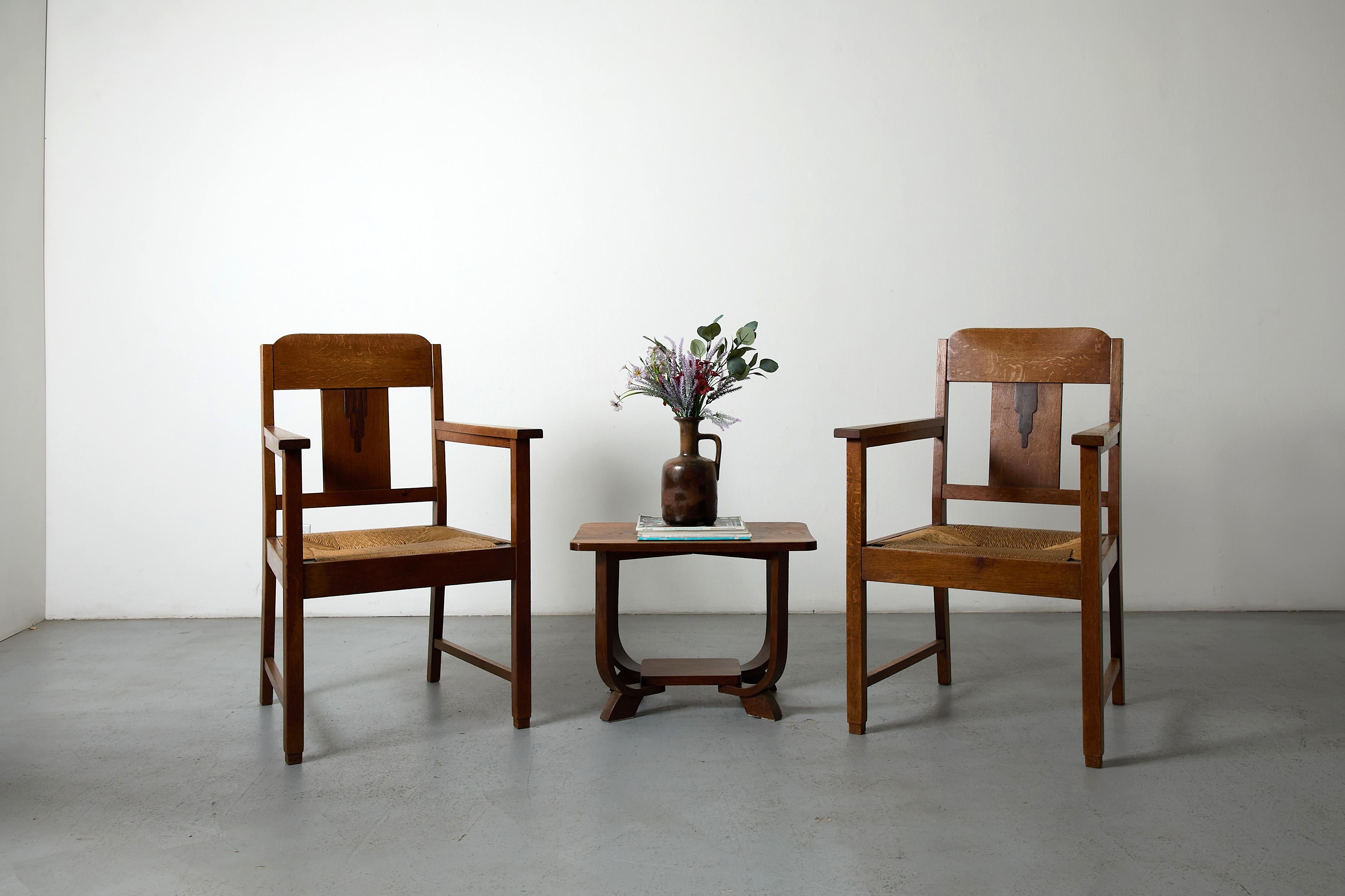 Paire de chaises à accoudoirs en chêne et jonc de l'école d'Amsterdam en vente 11