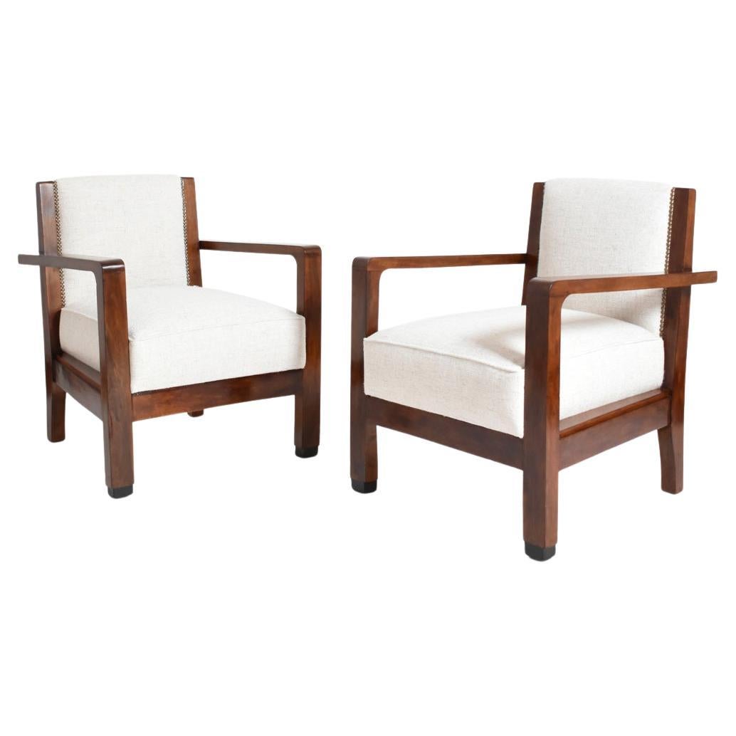 Pair of Amsterdam School wooden armchairs, 1930s