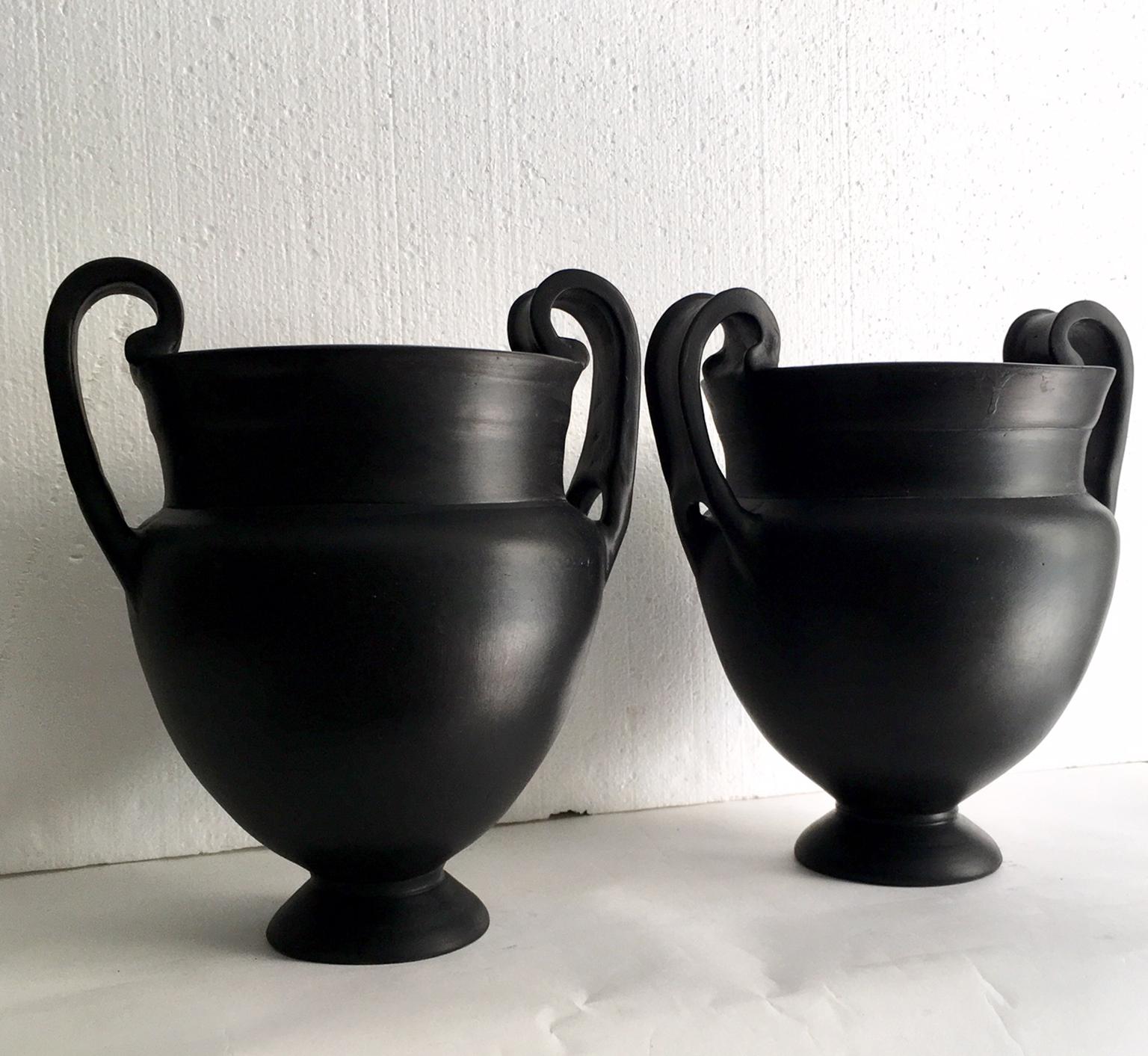 Pair of vases in the ancient Greece style, in black terracotta.