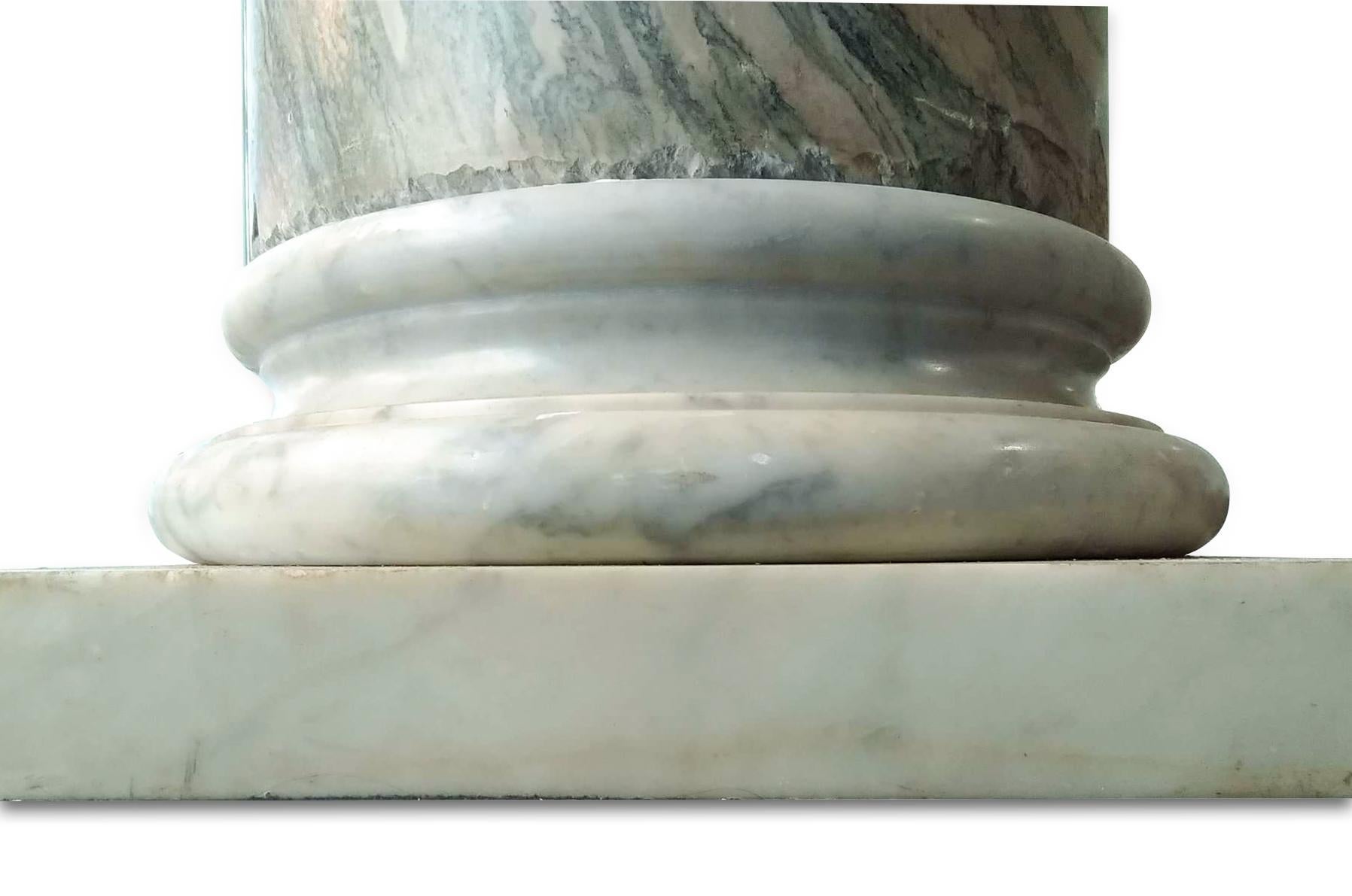 Pair of Marble Columns is an impressive original decorative object probably realized in the 19th century (bases are much older).

Original very fine green marble and white marble (Cipollino and Carrara marbles).

Handmade in Italy during the