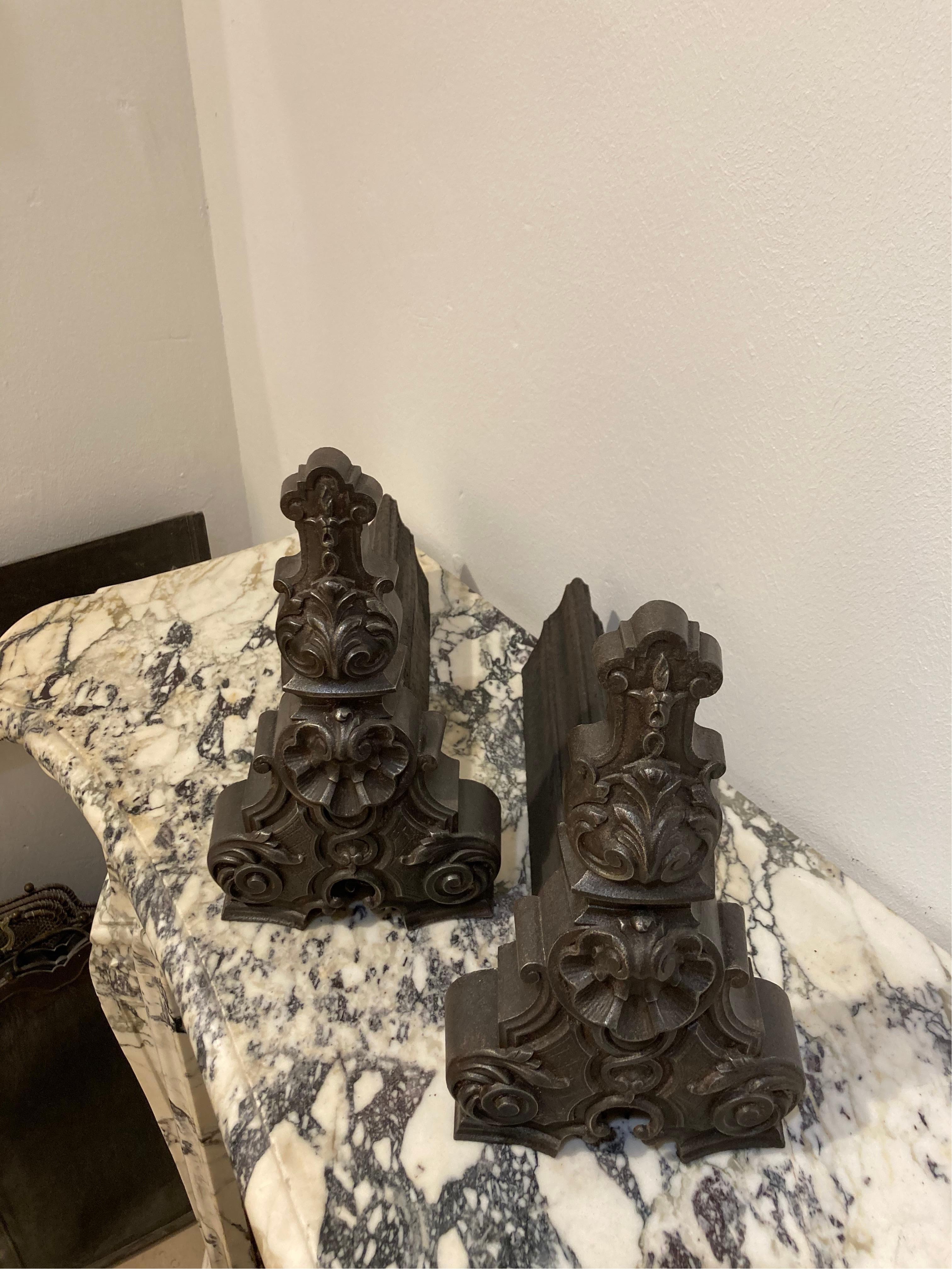 A nice and decorative pair of French andirons / fire dogs.
These hollow casted iron beauties are in lovely condition, with their perfect ratio they provide a nice filling statement in any modest sized hearth.

Sold by Schermerhorn Antique