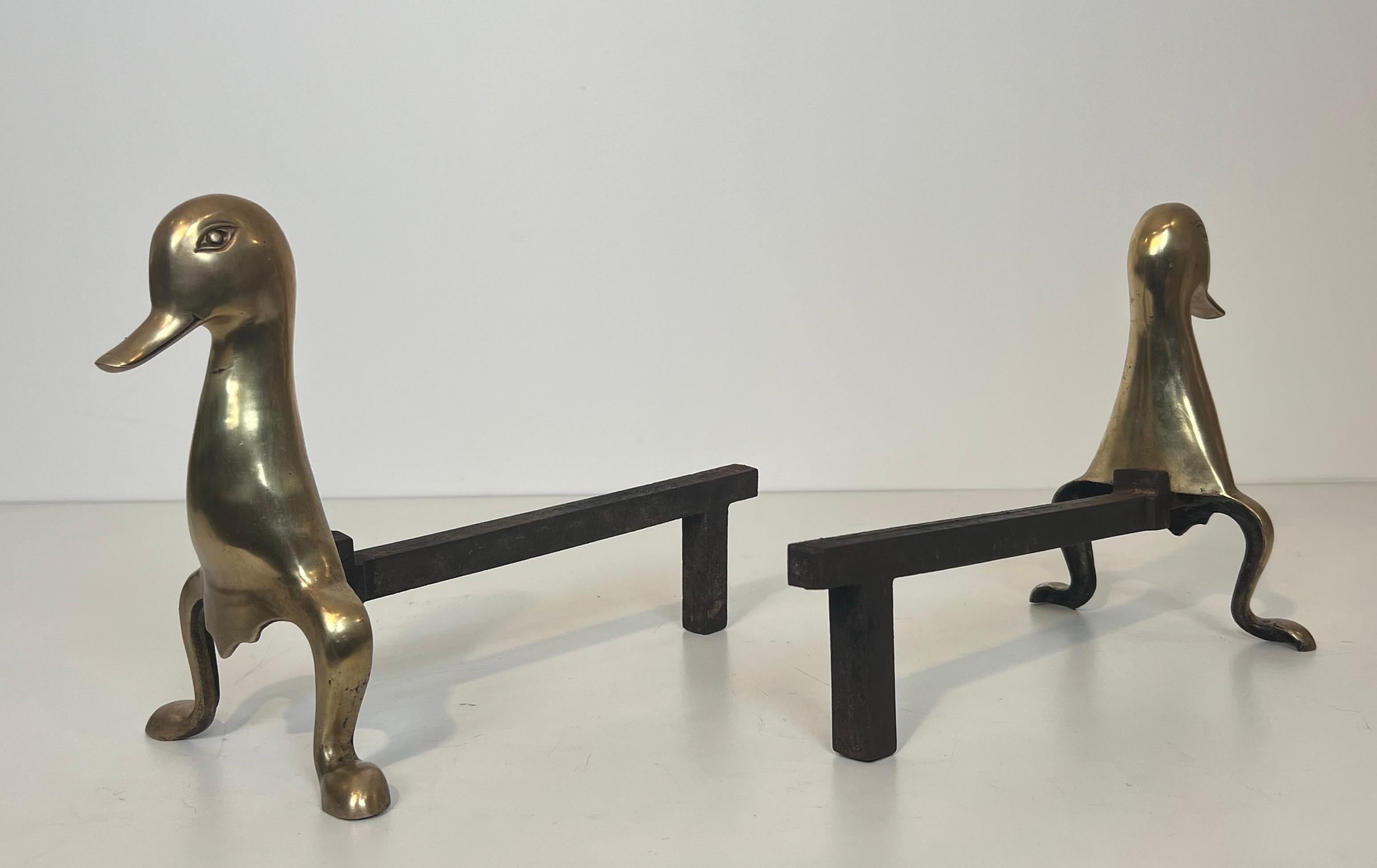 French Pair of Andirons Representing Stylized Ducks in Brass In the Taste of Claude and For Sale