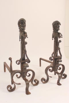 Pair of Andirons with Bronze Jester Faces