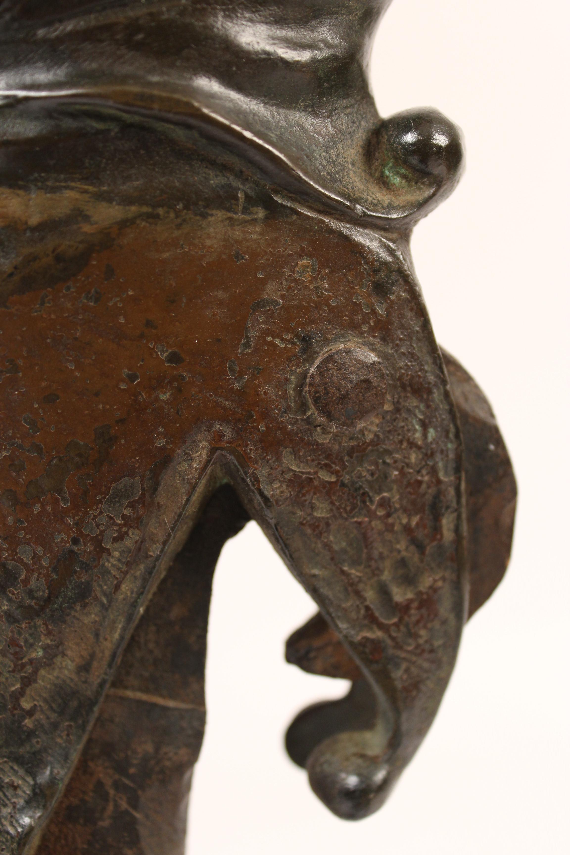 Pair of Andirons with Bronze Jester Faces 2